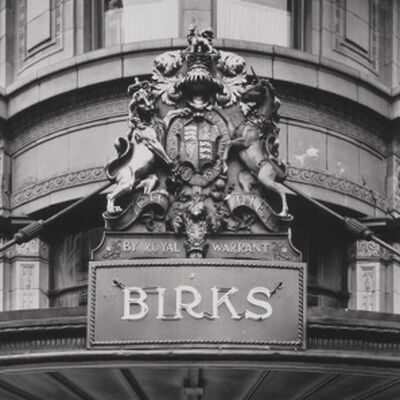 A black and white image of the historic Maison Birks storefront